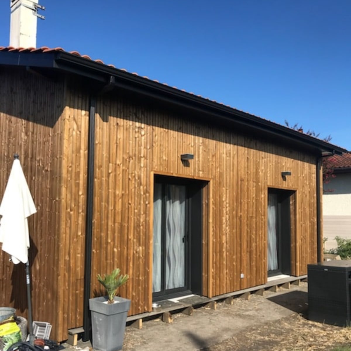 Photo d'une finition bardage à la suite d'une isolation thermique par l'extérieur